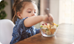 Child enjoying a healthy snack
