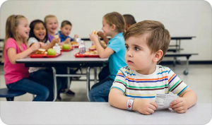 Children eating lunch together at school