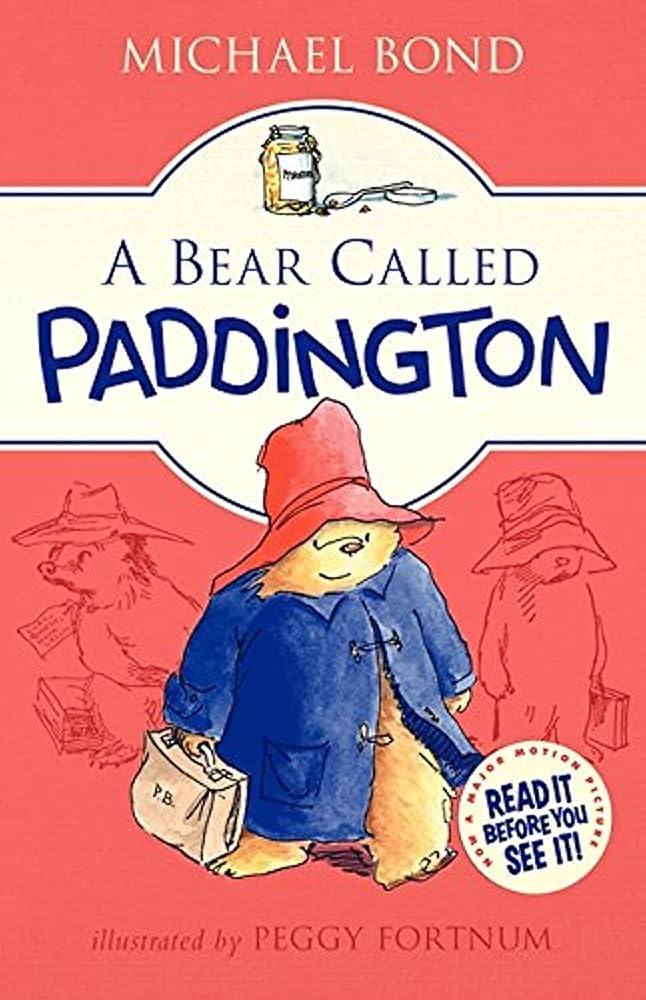 Book cover: 'A Bear Called Paddington' by Michael Bond, showing Paddington in a blue coat and red hat with a suitcase.