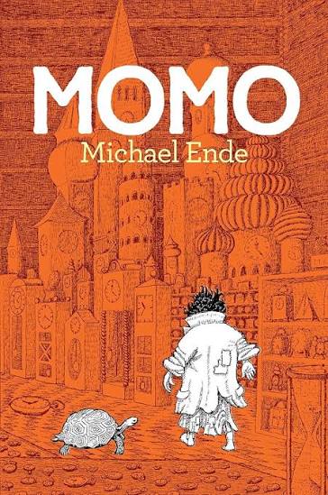 Book cover for MOMO by Michael Ende, orange fantasy cityscape with onion domes and a white-clad figure walking beside a turtle.