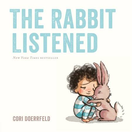 Book cover of The Rabbit Listened by Cori Doerrfeld, showing a child in striped pajamas hugging a pink rabbit.